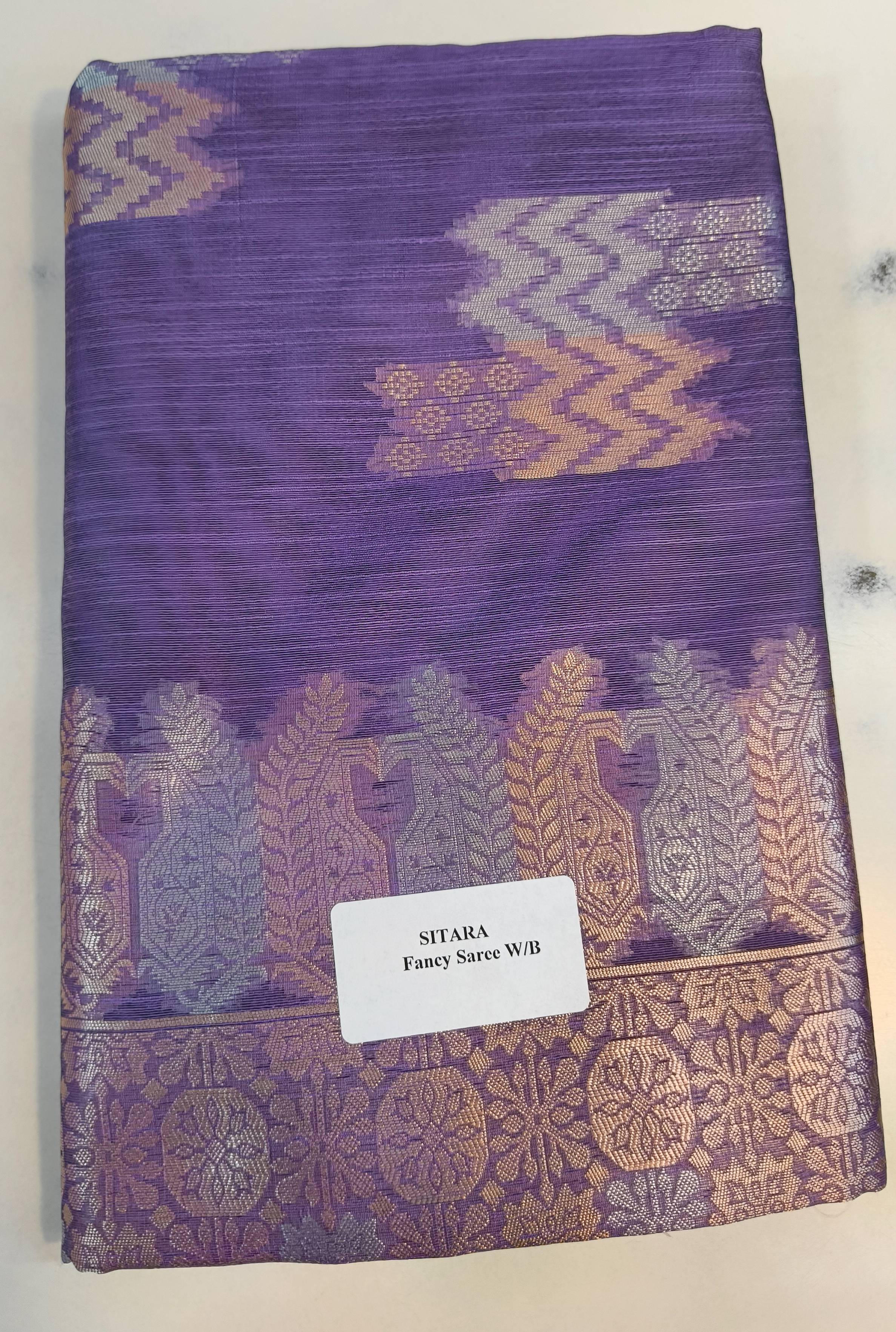Elegant Lelan Silk Sitara Fancy Saree in vibrant colors with intricate traditional patterns displayed against a soft backgrou - Image 1