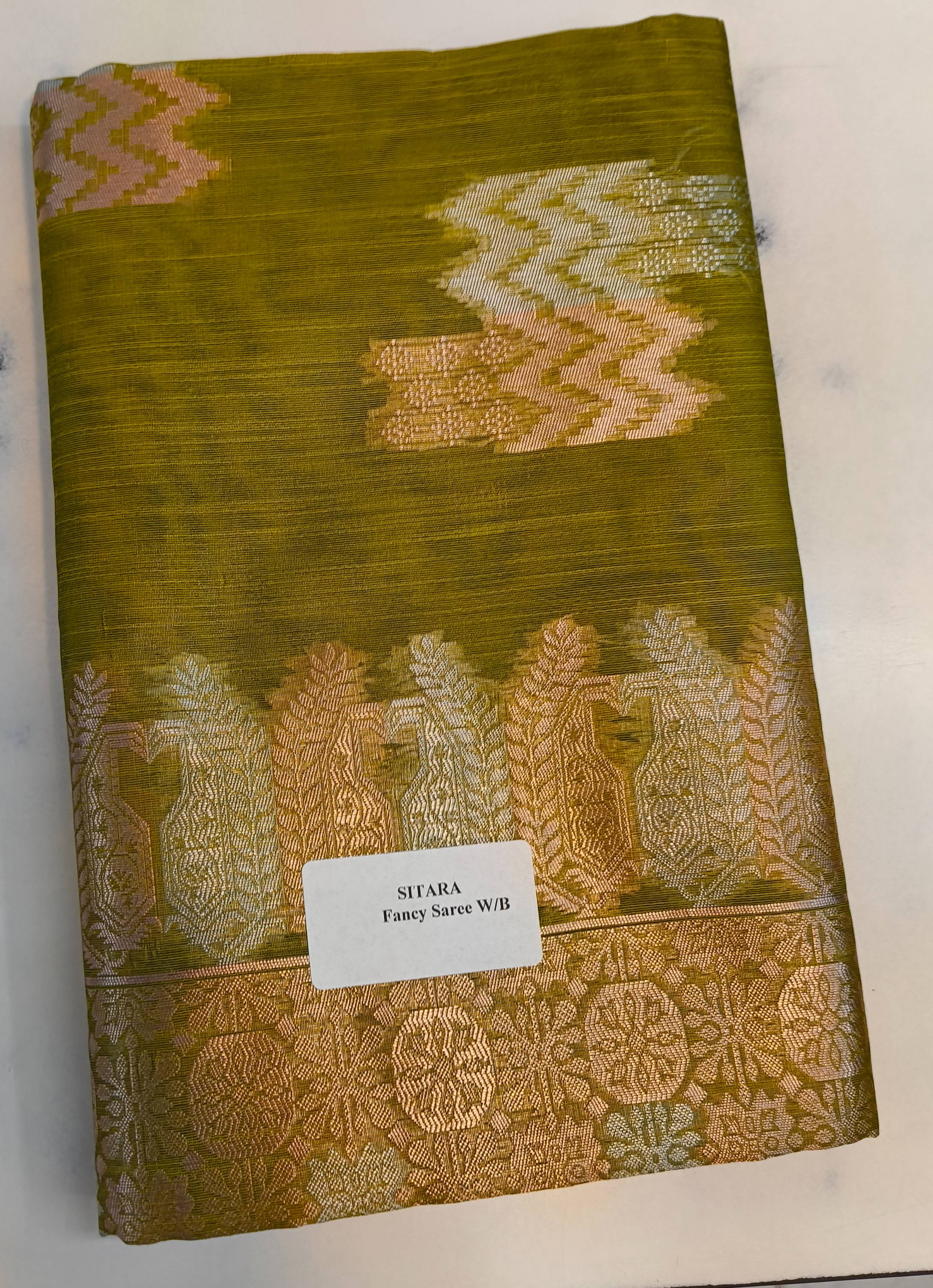 Elegant Lelan Silk Sitara Fancy Saree in vibrant colors with intricate traditional patterns displayed against a soft backgrou - Image 3