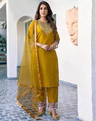 Stunning embroidered mustard kurta set from LALLY GARMENTS in TANDA featuring an elegant neckline and matching pants