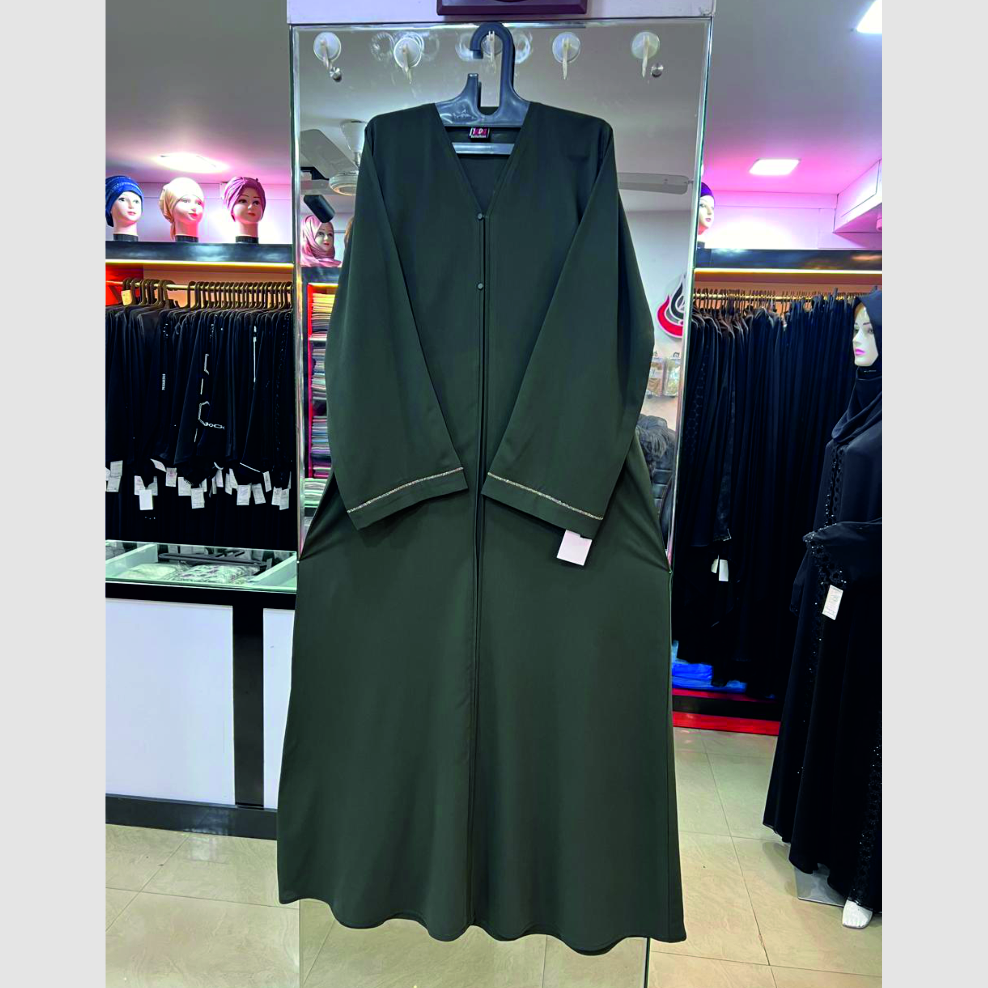Black Basic Abaya displayed elegantly, showcasing modest fashion in Mangalore.