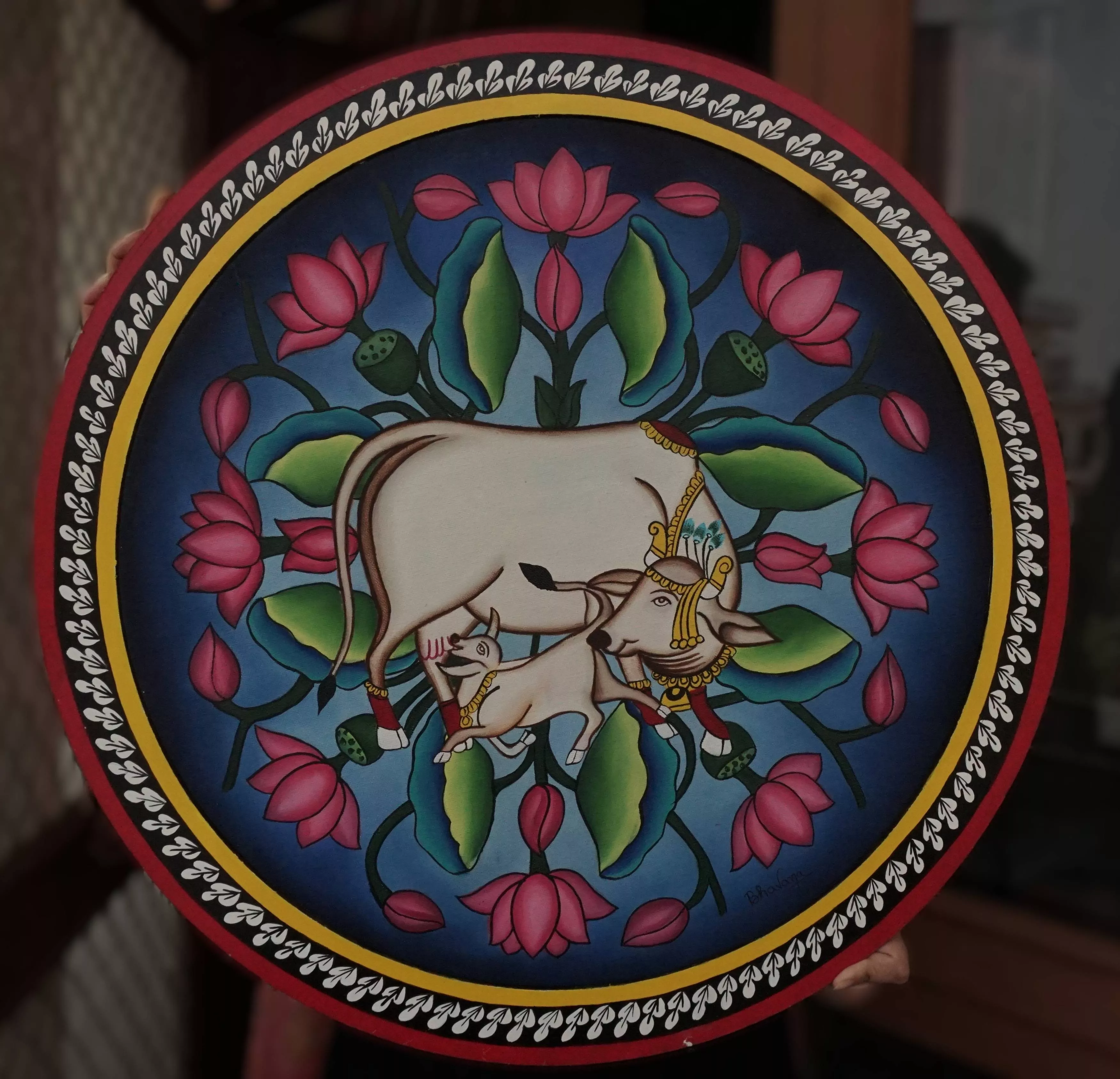 Handcrafted Kamdhenu Cow - Phad Style artwork framed, 2ft diameter, showcasing intricate designs and vibrant colors, located 