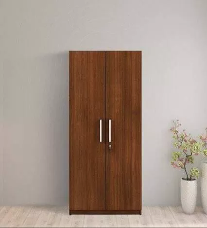 Stylish Wooden Wardrobe in Gurdaspur featuring two doors, handles, and a secure lock, ideal for organizing clothes.