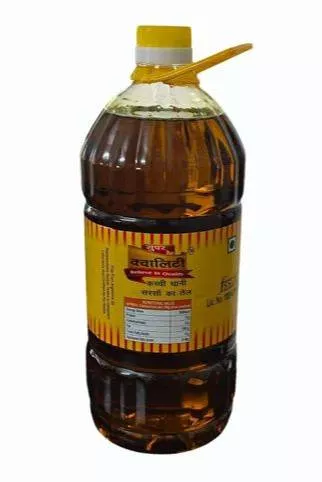 Patanjali Mustard Oil bottle with a green label, showcasing premium quality for cooking, located in Imphal West.