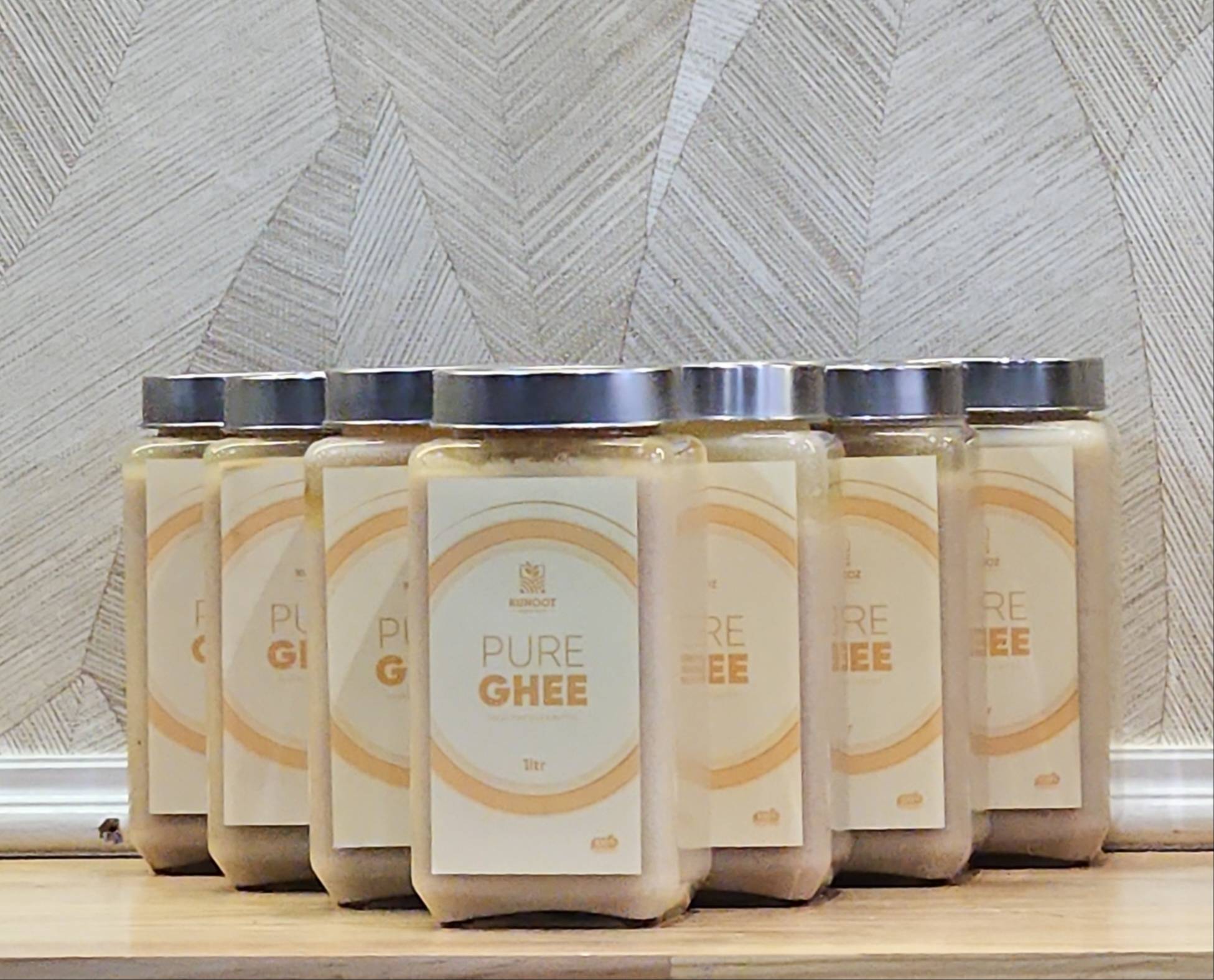 Premium Kunooz Pure Ghee in a 1-litre container, ideal for aromatic cooking, available in Hyderabad.