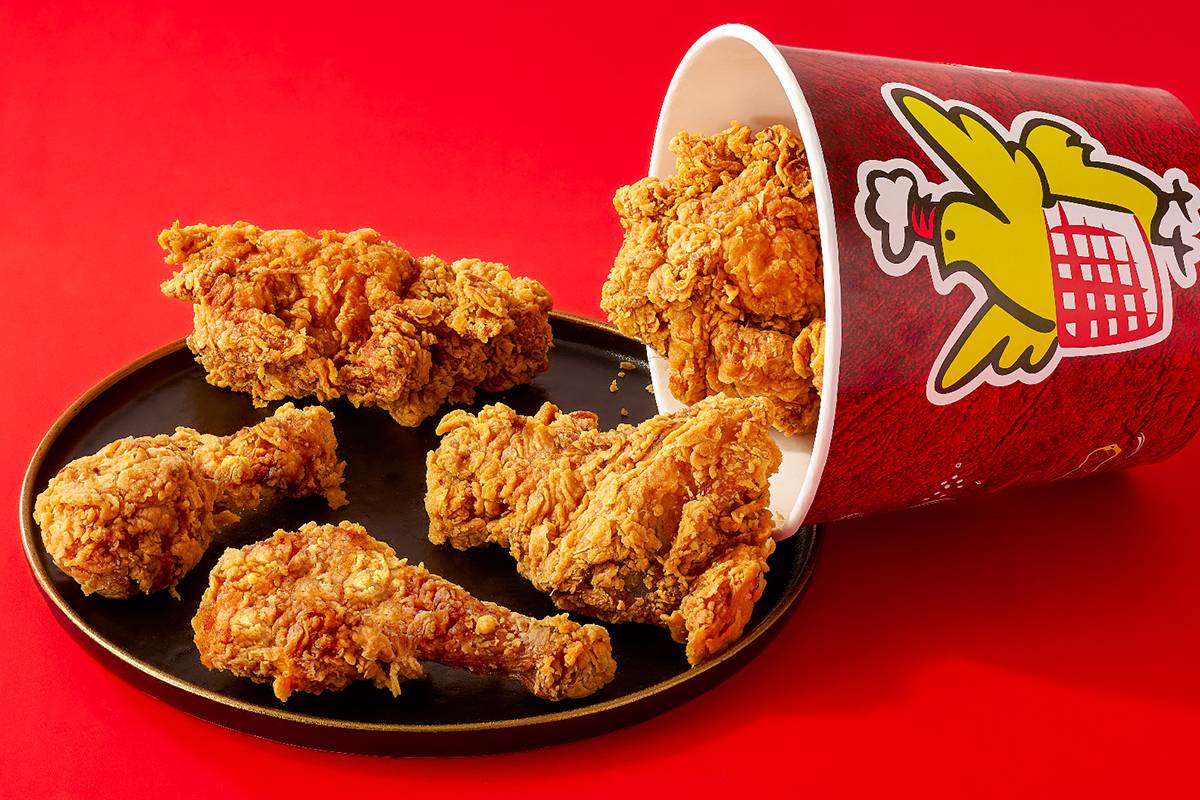 Golden crispy Fried Chicken Bucket with 5 pies from FIVE STAR CHICKEN in Hyderabad, showcasing the delicious fried chicken an