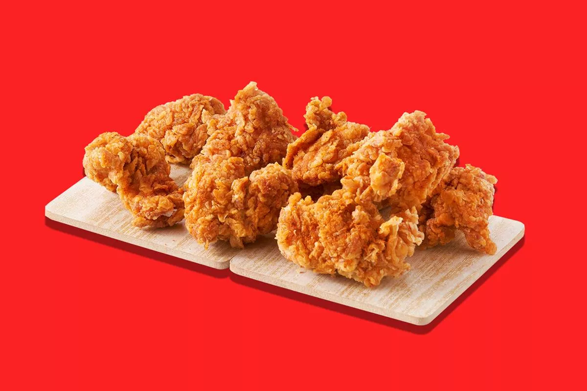 Crispy and spicy KRUSTY BITES Chicken pieces from FIVE STAR CHICKEN in Hyderabad, showcasing a golden-brown coating and tempt