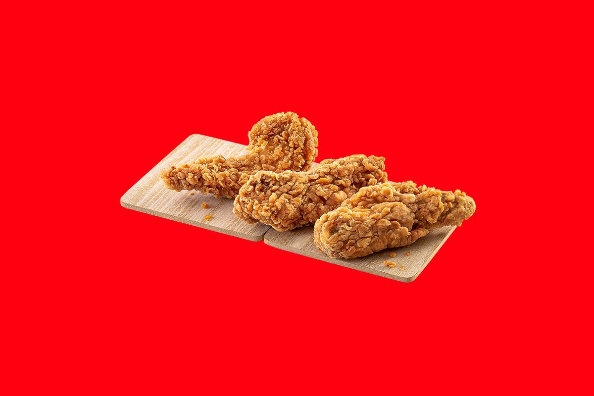 Crispy and juicy fried chicken strips served in a basket with a side of dipping sauce at FIVE STAR CHICKEN in Hyderabad