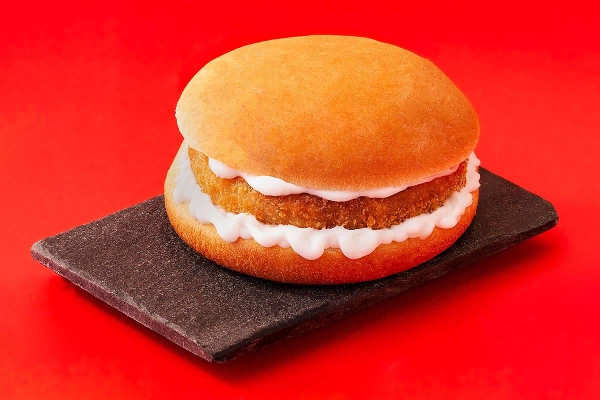 Star Chicken Burger featuring a crispy coating and creamy mayonnaise, served on a fresh bun, in Hyderabad.