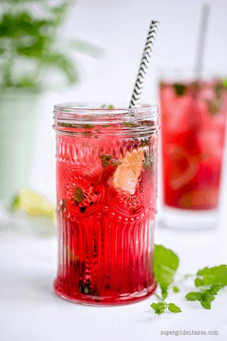 Refreshing Double Berry drink with vibrant berry colors and citrus slices in Hyderabad — energizing mix from FIVE STAR CHICKE
