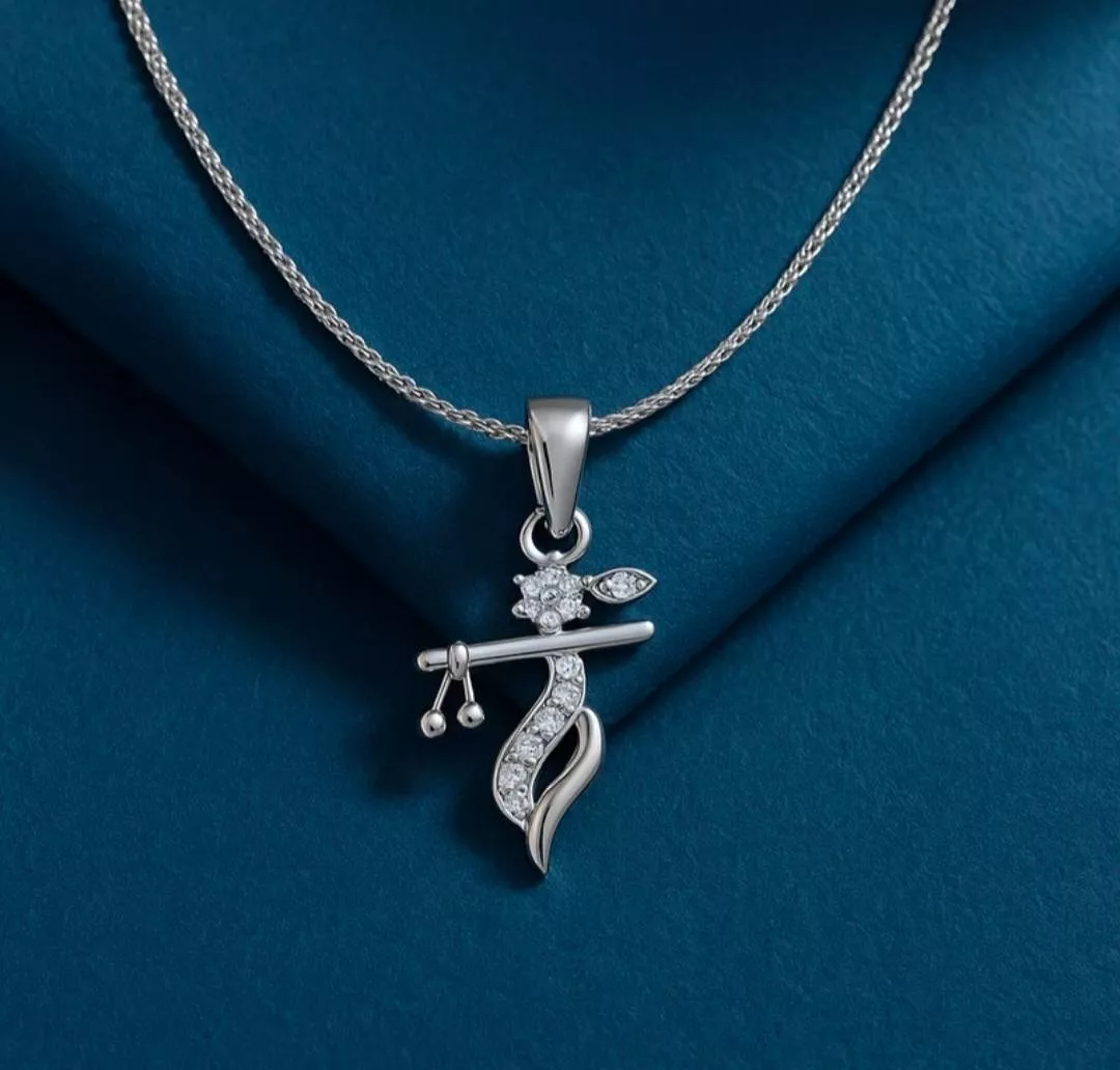 Exquisite silver pendant with unique Krishna-shaped design from NASEEB JEWELLERS in Nakodar, showcasing intricate craftsmansh