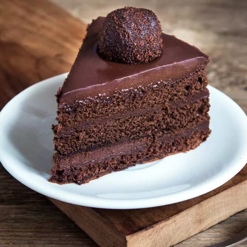 Decadent chocolate cake from Dinesh Fruit Shop in Dhariwal, featuring rich chocolate icing and layers, perfect for celebratio