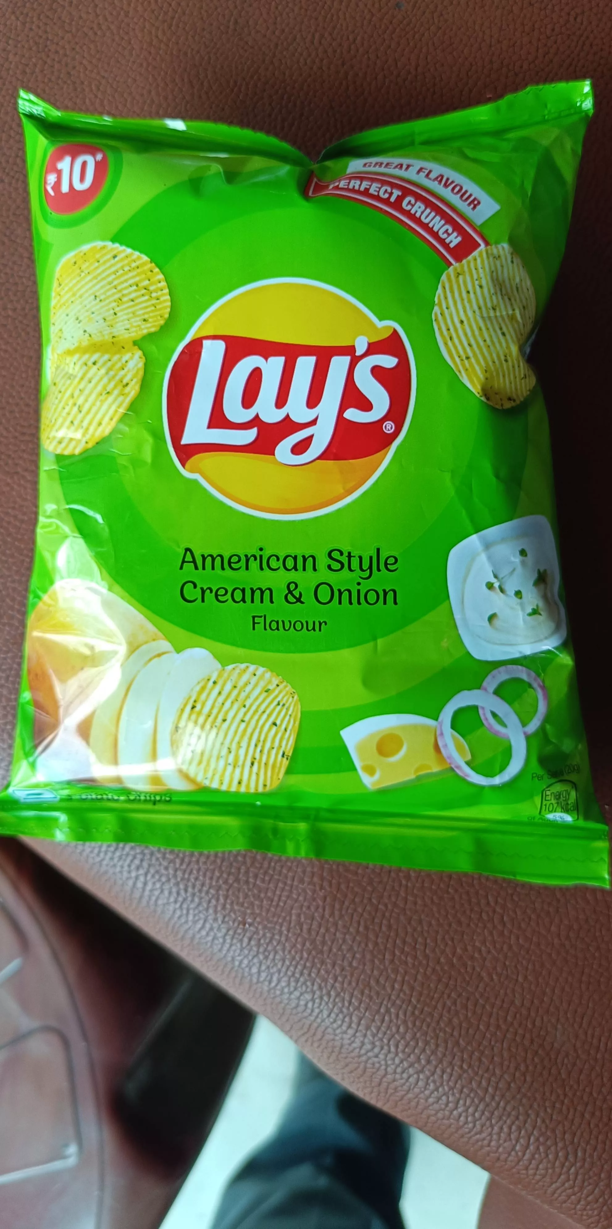 Crispy Lay's Potato Chips in Cream & Onion flavor, packaged and ready for snacking, available at GANESH KUMAR GUPTA in Tinsuk