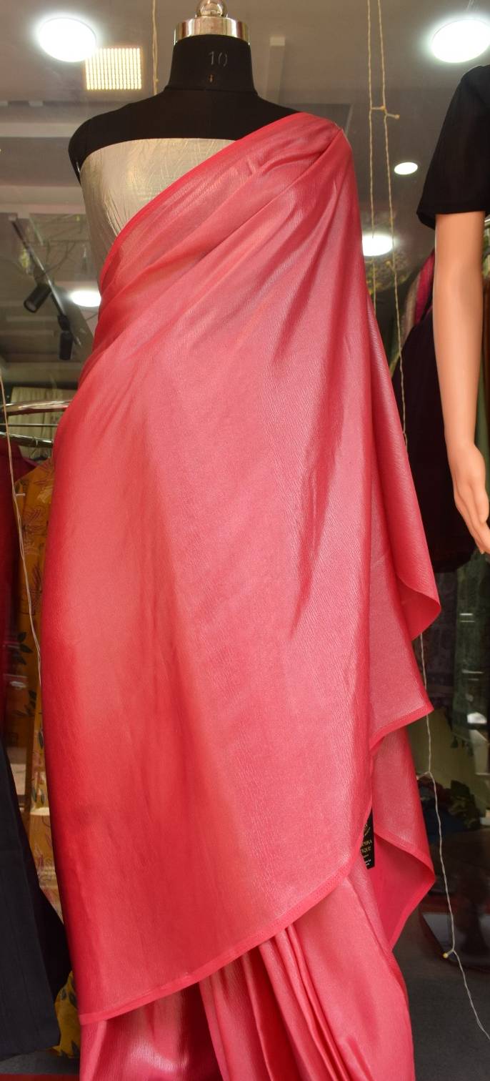 Elegant pink saree fabric displayed elegantly, showcasing its charming color and quality, available at SHEETESH SONI in GORAK - Image 1
