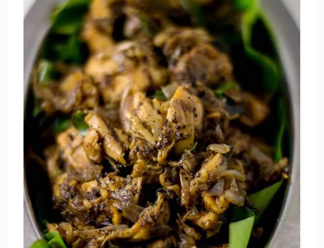 Delicious Tamilnadu Special Shredded Chicken Fry served in a platter, showcasing its crispy texture and rich spices — Tamilna