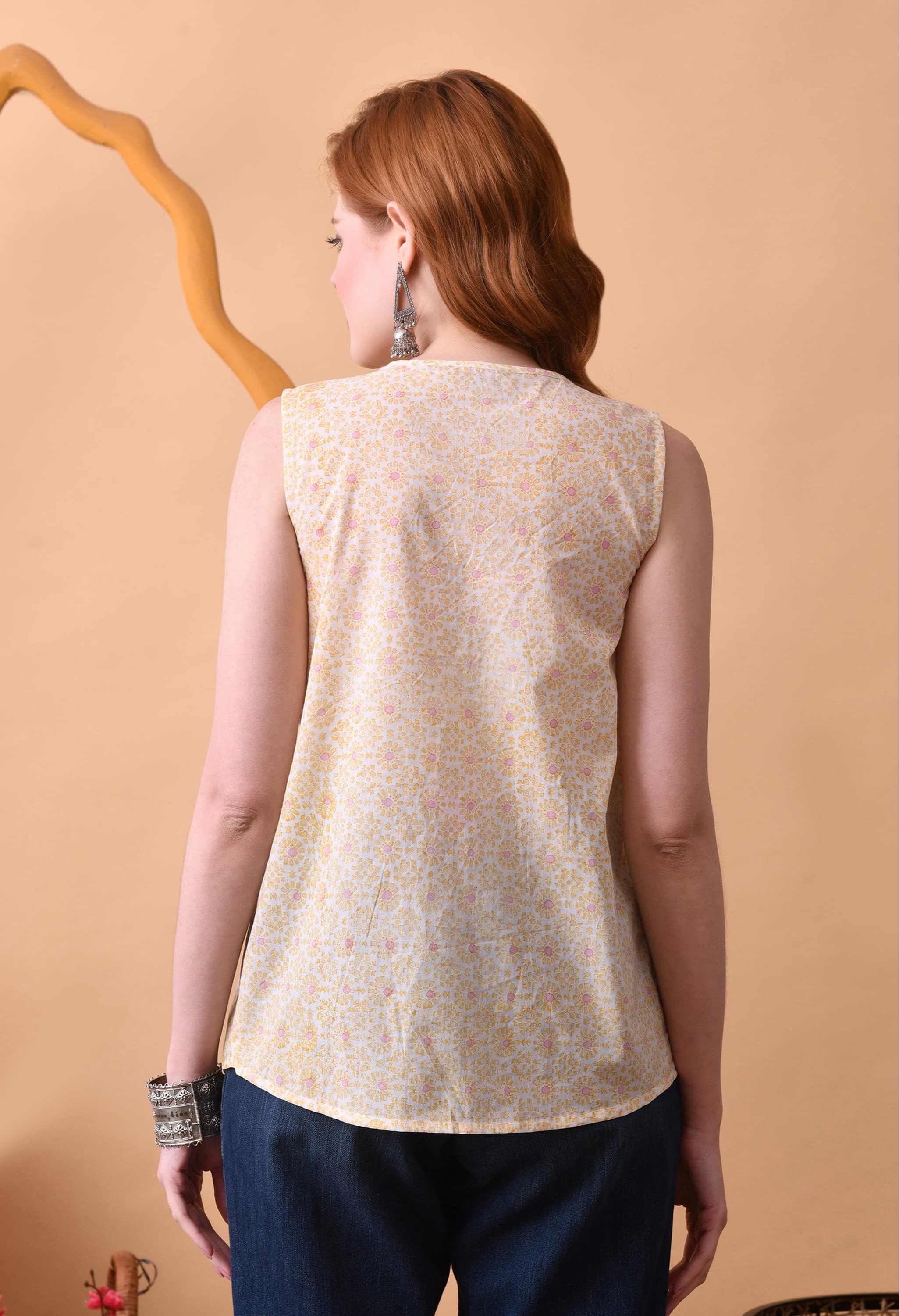Floral Print Sleeveless Tie-Up Neck Pleated Top in Jaipur with a vibrant floral design, perfect for summer outfits. - Image 3