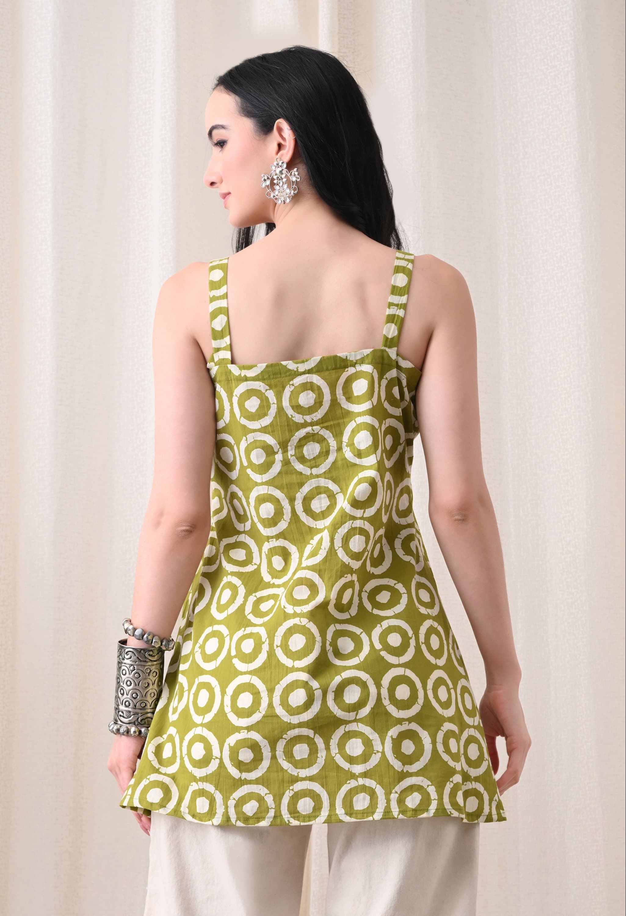 Stylish short kurti in Jaipur featuring a sleeveless design, pleats, and a trendy tie-up neck, perfect for summer wear. - Image 3