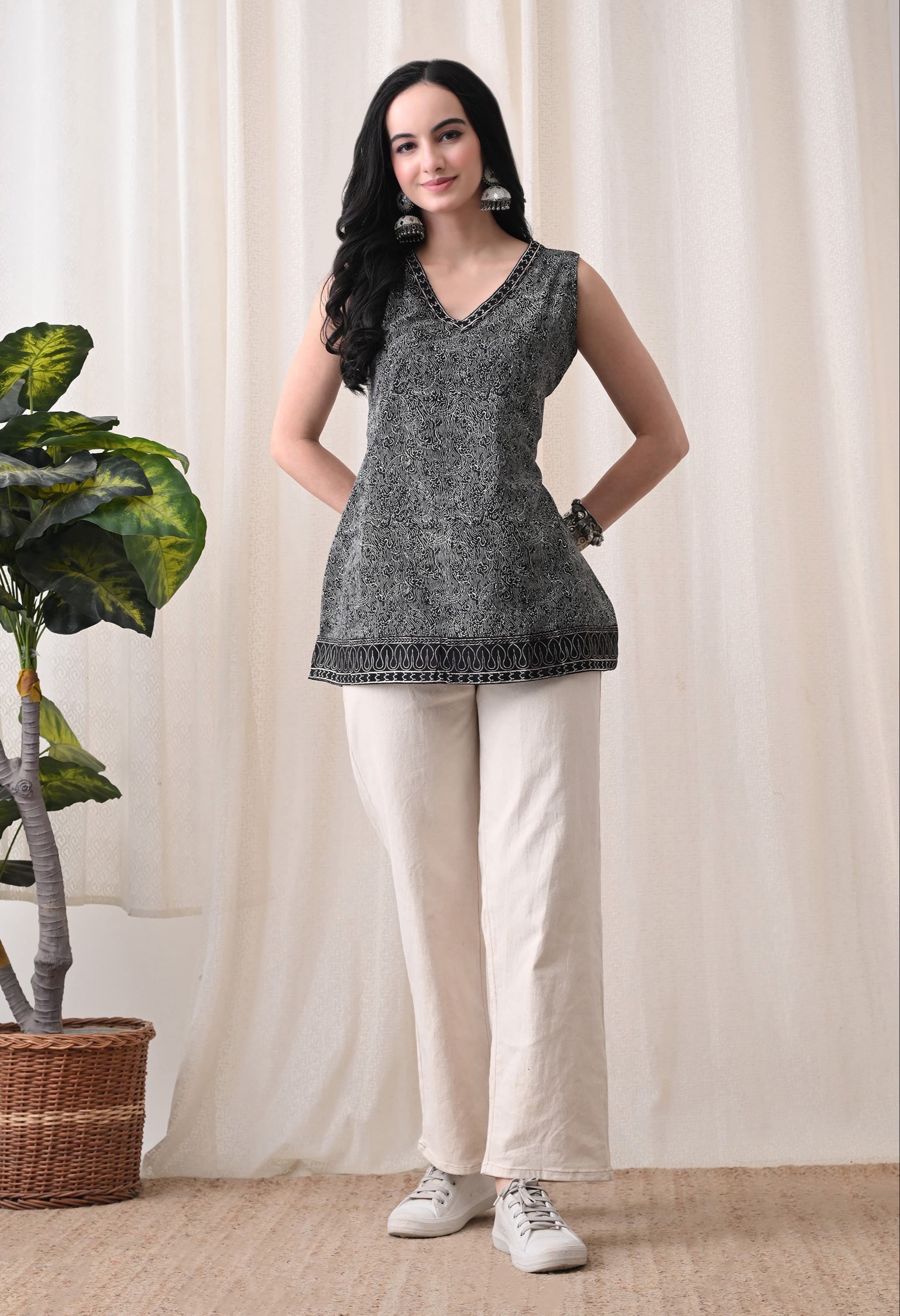 Stylish black sleeveless top with a tie-up neck design from CLICK KART in Jaipur, perfect for summer fashion. - Image 2