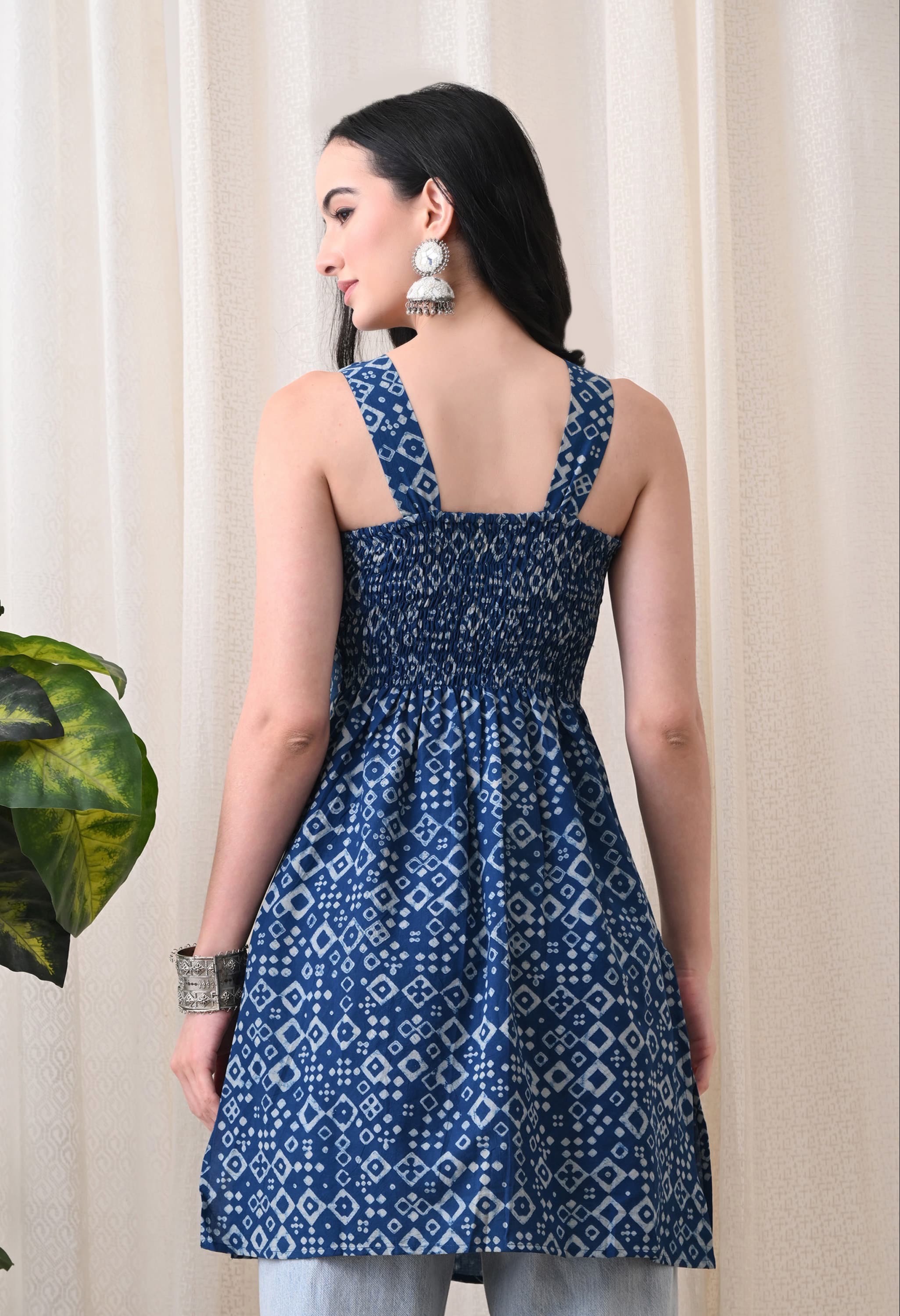 Chic indigo blue sleeveless smocked short kurti with geometric print, ideal for a modern wardrobe, from Kurti Vibe in Jaipur. - Image 1
