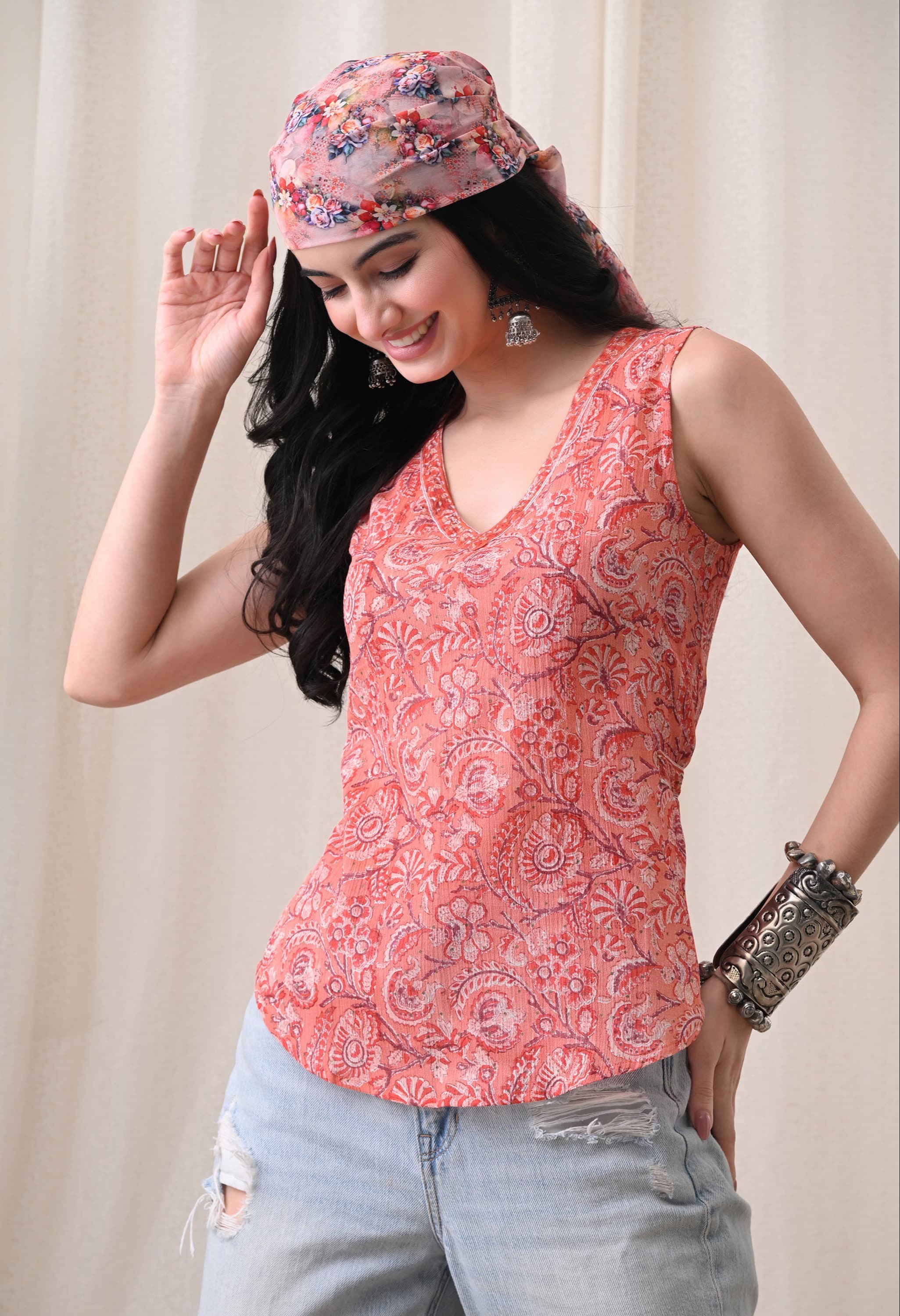 Vibrant peach Kurti Vibe Women's Floral Paisley Print Sleeveless Short Kurti Top displayed on a mannequin in Jaipur, showcasi - Image 4