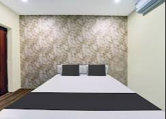 Luxury Bedroom Suite featuring elegant design and modern aesthetics in Dhanbad, complete with a stylish bed and matching furn - Image 2