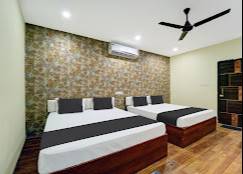 Luxury Bedroom Suite featuring elegant design and modern aesthetics in Dhanbad, complete with a stylish bed and matching furn - Image 4