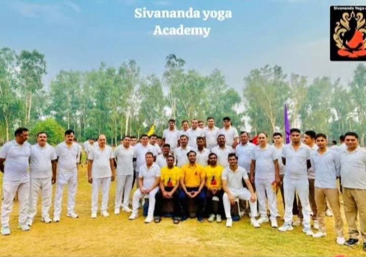 Sivananda Yoga Academy International Yoga Day event in Moradabad showcasing participants practicing yoga in a serene environm - Image 3