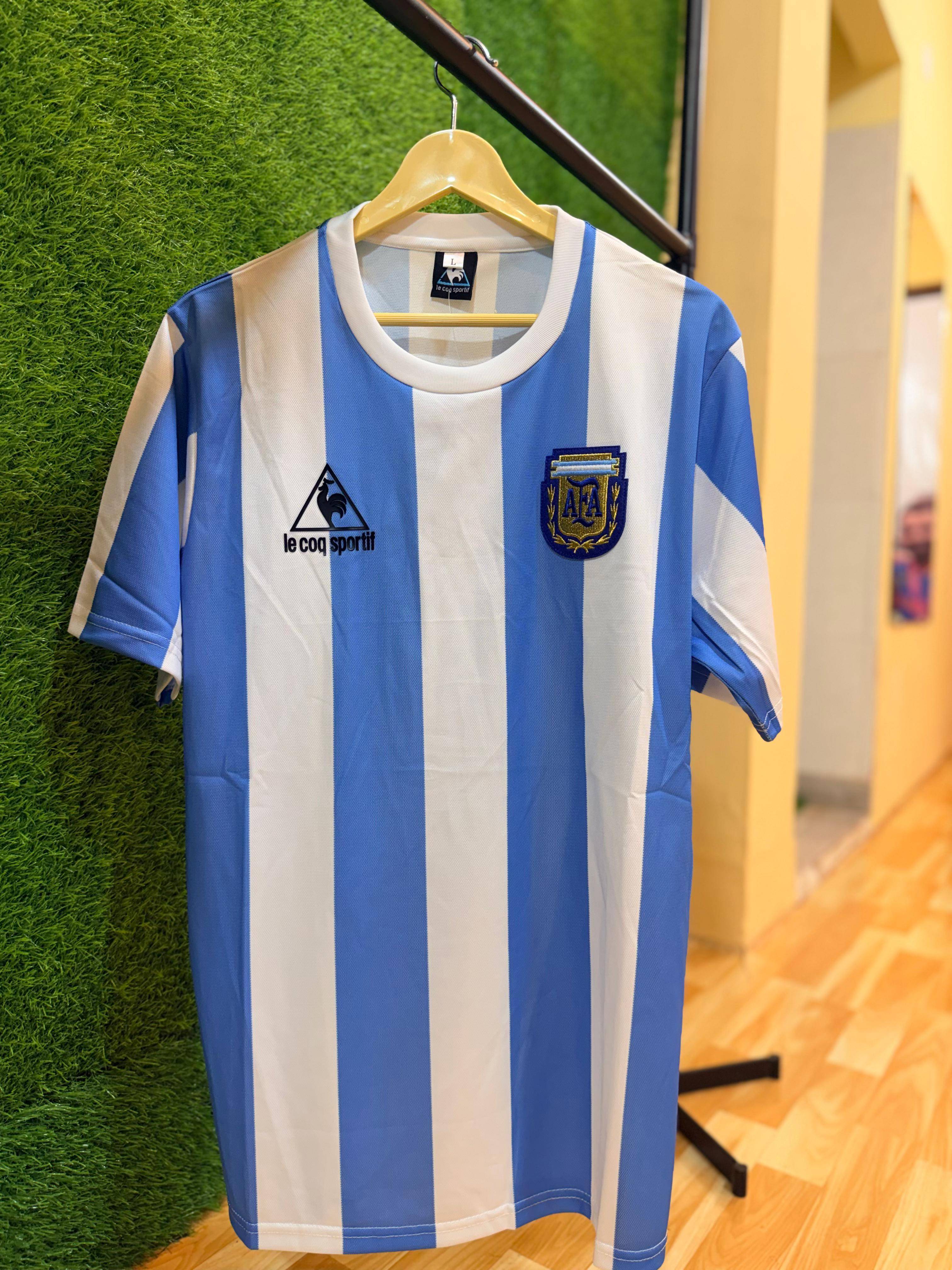 Le Coq Sportif Argentina Football Jersey showcasing iconic blue and white design, perfect for football fans, available in Kol