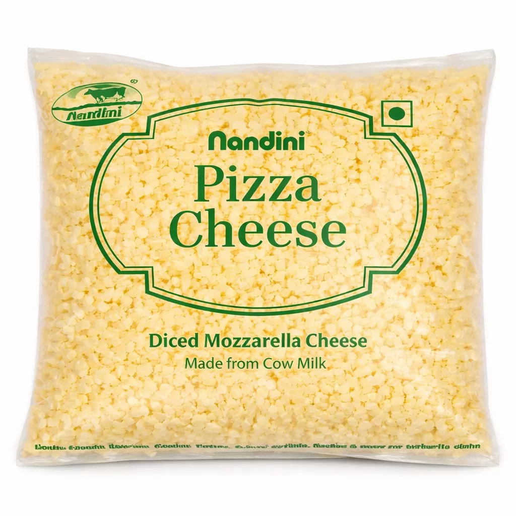 Diced premium Mozzarella cheese for pizzas, Nandini Pizza Cheese available at SHREE SEVA AGENCY in Alibag, Maharashtra.