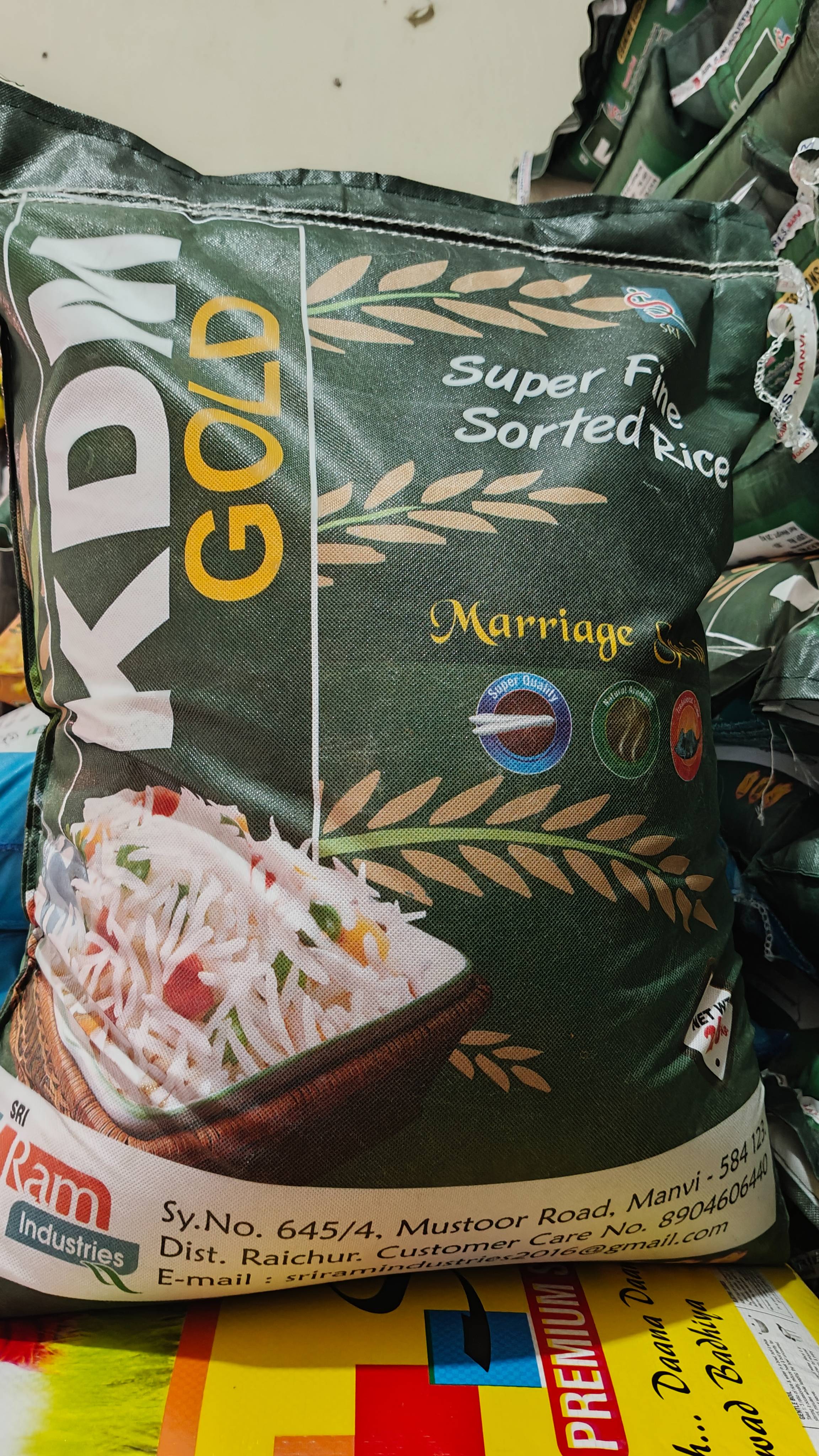 Premium KDM Gold Super Fine Sorted Rice in a bag, showcasing its quality and texture, available at BASAVASRI TRADERS in Manvi