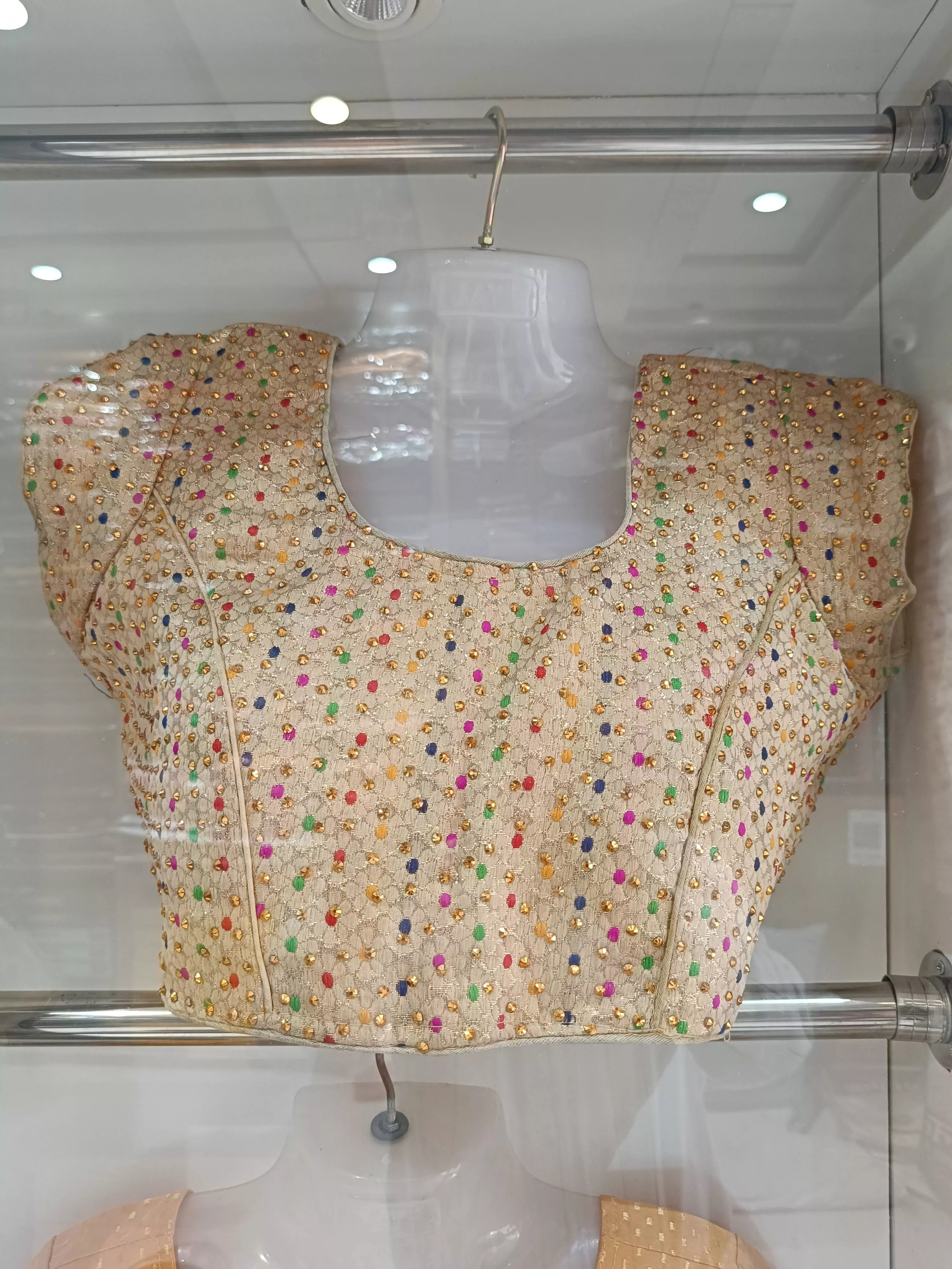 Multicolor embroidered blouse designed with intricate patterns, available at JANTA CLOTH STORE in Sirathu.