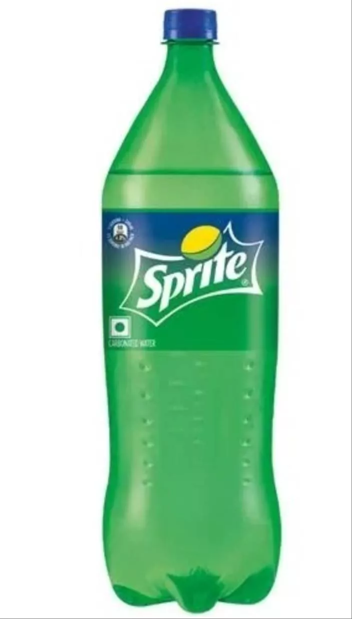 Cold bottle of Sprite soft drink showcasing its vibrant lemon-lime flavor, available at NEW ASHOK KARYANA STORE in DHAKOLI.