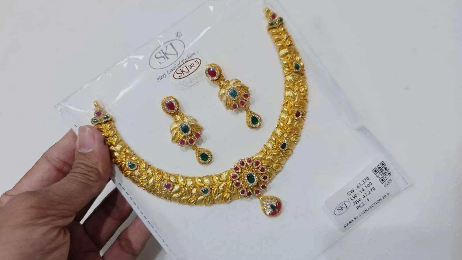 Elegant SKJ Traditional Gold Plated Necklace Set featuring vibrant stones, perfect for special occasions — UTRAULA