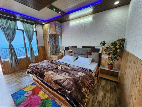 Hotal Modal Resorts in Dharmshala featuring comfortable, well-furnished rooms and scenic views for an affordable stay.
