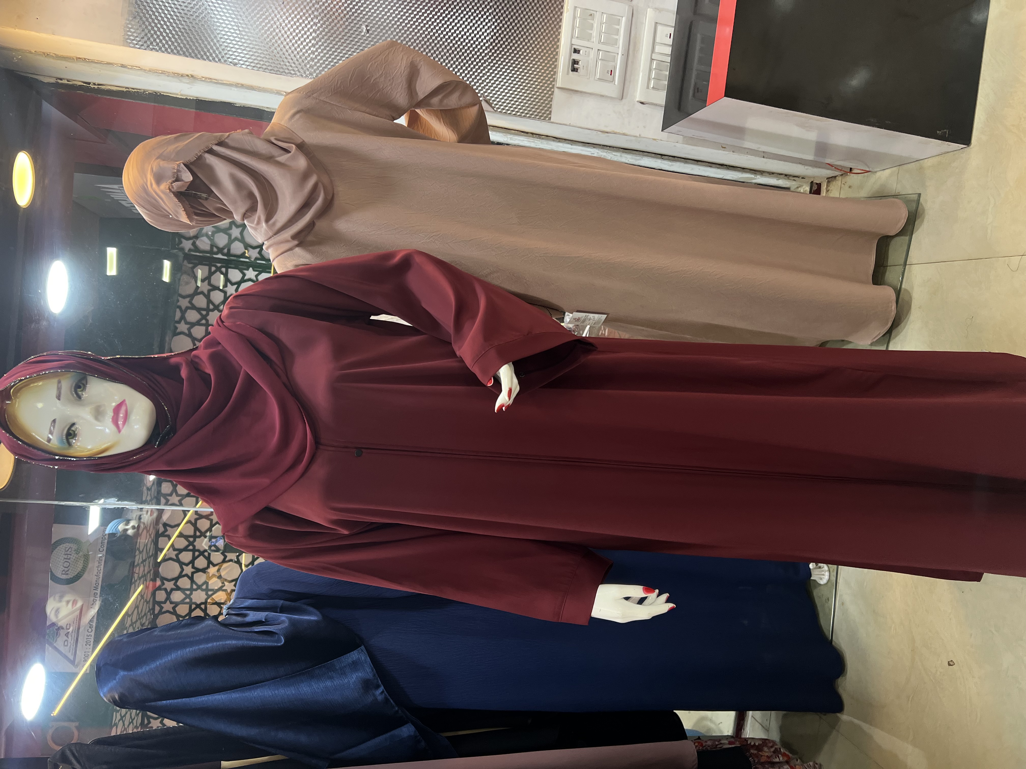 Maroon daily wear abaya on display from NADA BURKHA HOUSE in Mangalore