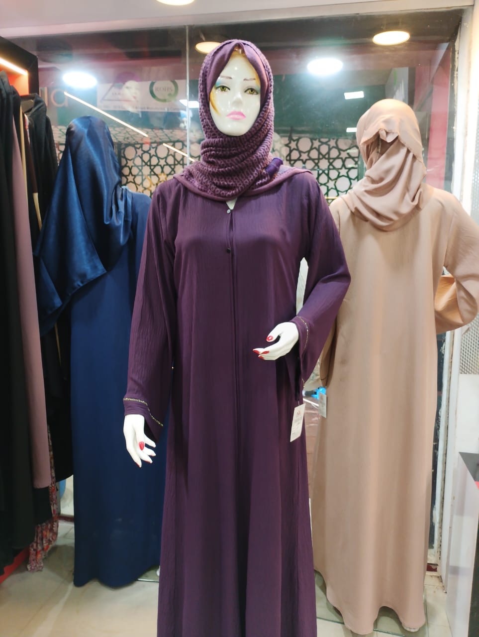 Vibrant purple Imported Soft Crush Abaya with stone details displayed in Mangalore