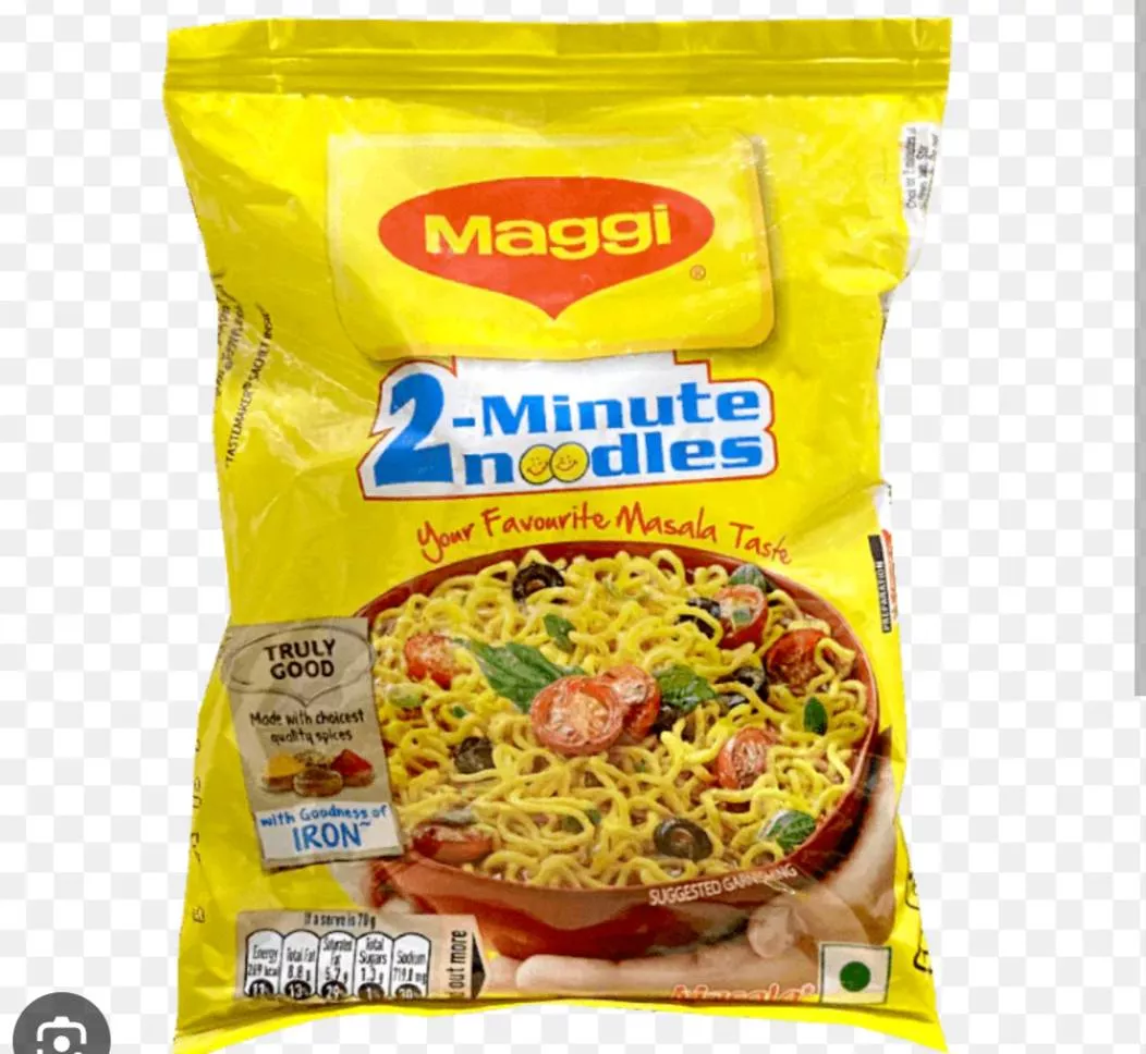 Pack of Maggi instant noodles with vibrant packaging showcasing flavor options, available at DEISY EGG ENTERPRISE in Beltola.