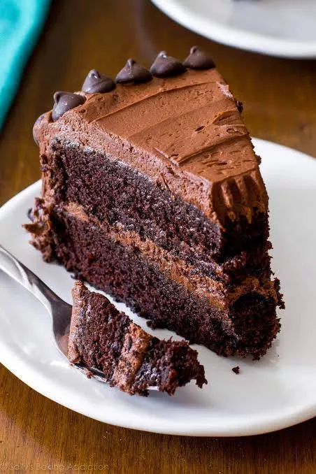 Decadent Chocolate Fudge Cake topped with nuts and badam in ANANTHAPUR, drizzled with rich chocolate syrup - Image 1