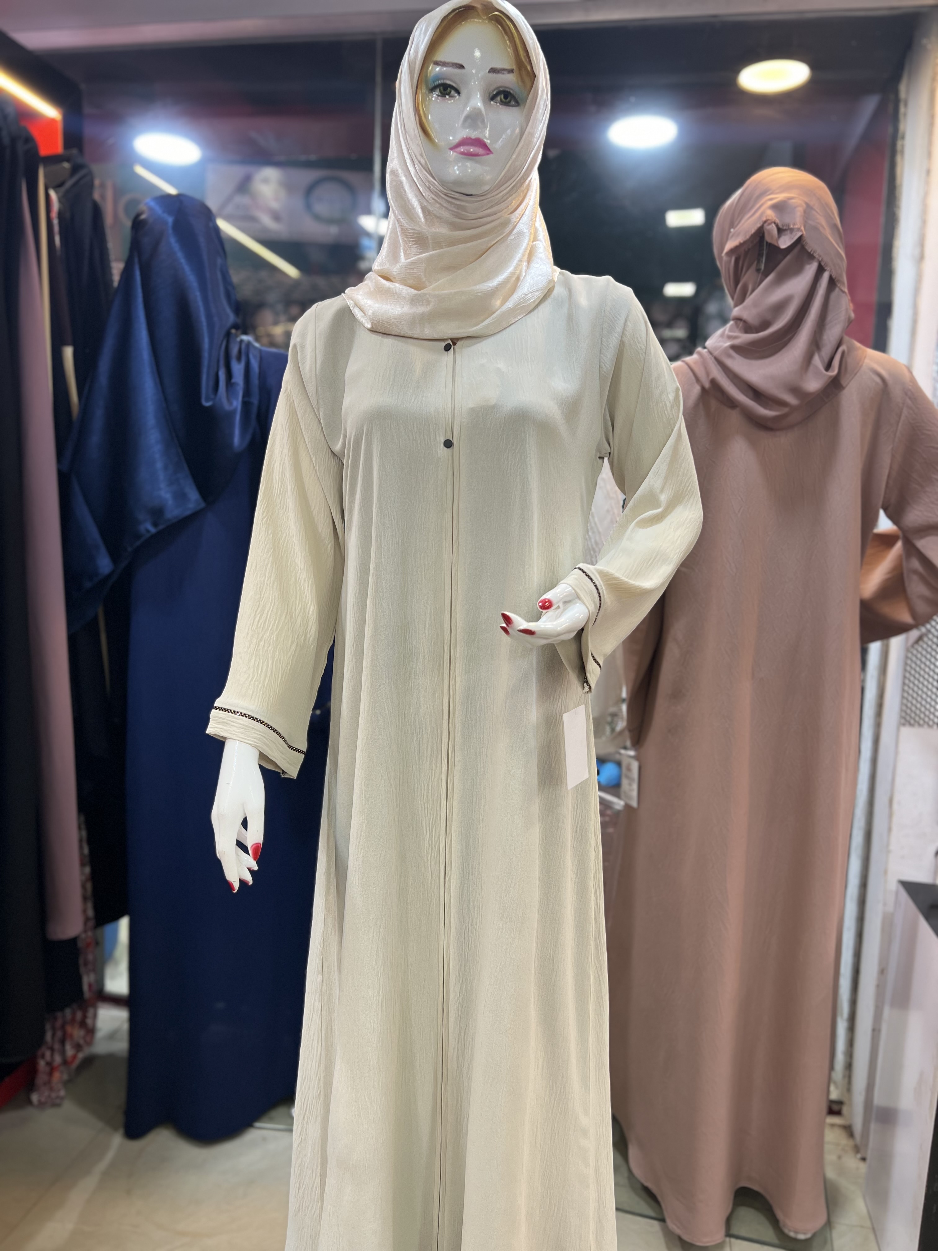 Imported Cream Soft Crush Abaya displayed elegantly in Mangalore, showcasing luxury and style.
