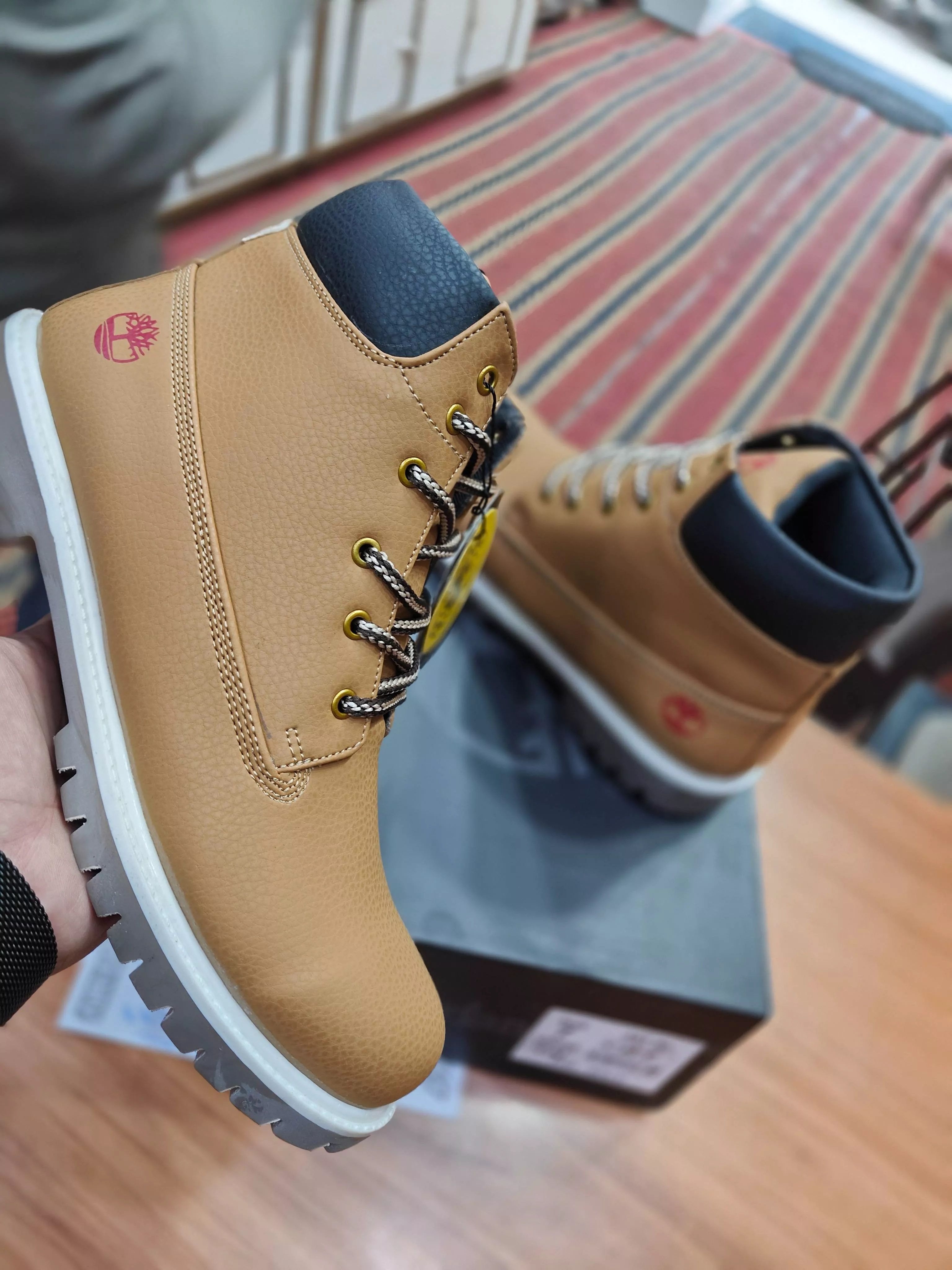 Stylish Timberland shoes crafted from premium leather for boys aged 20-40, available at MADDAN FOOTWEAR in Kartarpur.