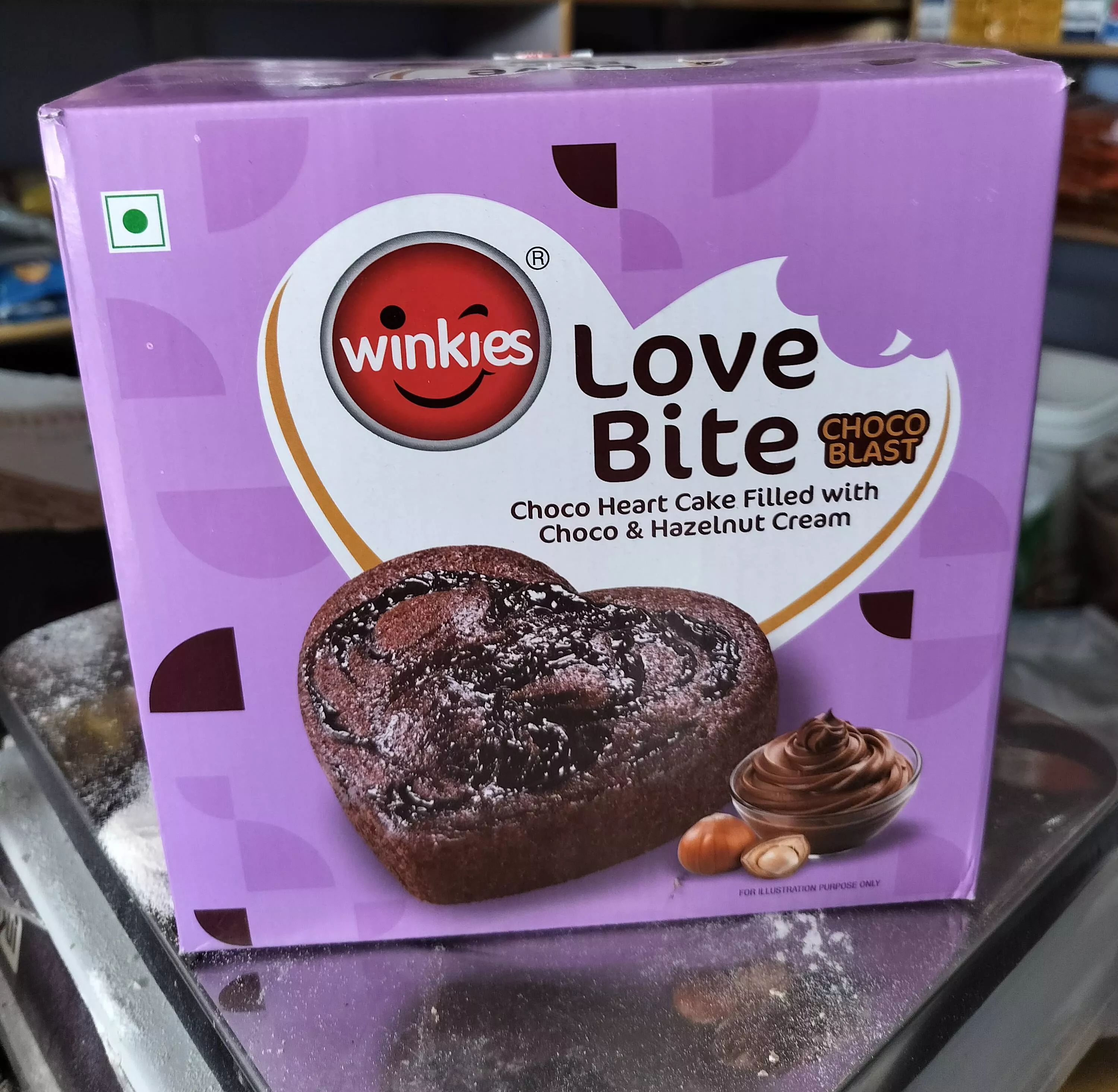 Love Bite Chocolate in Tihu featuring rich hazelnut cream filling wrapped in colorful packaging, perfect for a sweet treat.