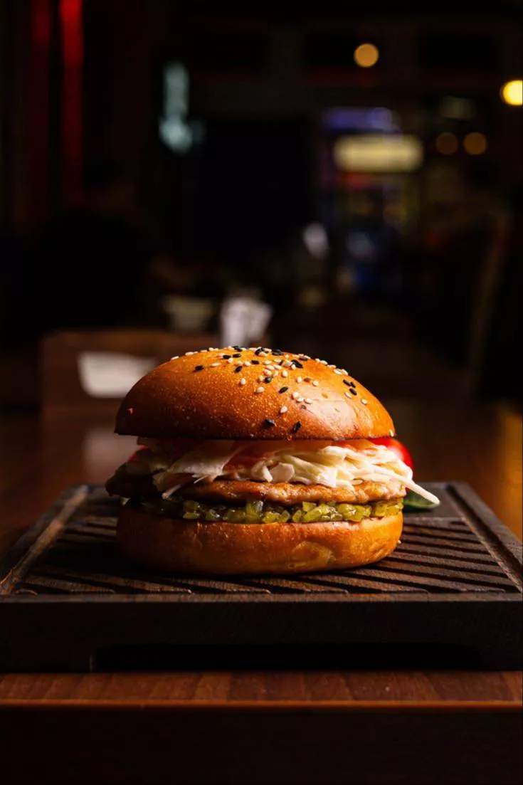 Mouth-watering burgers served at MG4 CHOUPATTY in PATHANKOT, showcasing a variety of toppings and flavors to satisfy every ap