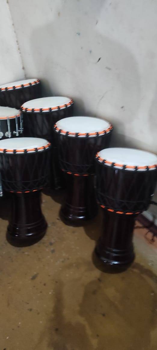 Handcrafted DJEMBE DRUM showcasing intricate carvings and vibrant tones, available at MELODY MAKERS INDIA in Meerut.