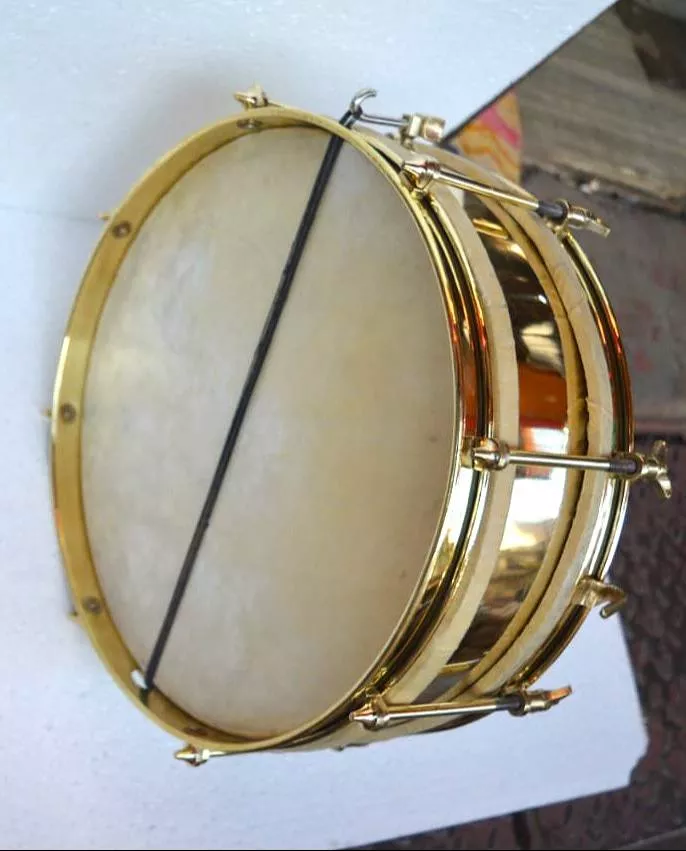 BRASS SIDE DRUM 12'' in Meerut — a polished brass drum with a vibrant finish, showcasing its craftsmanship and resonant quali