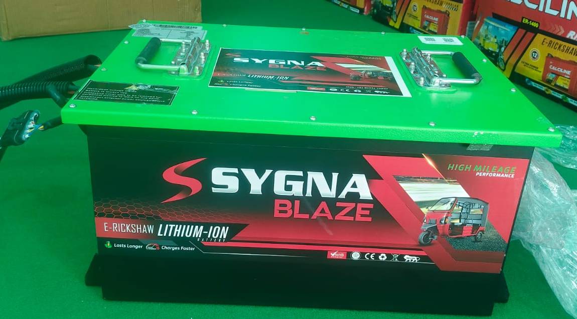 SYGNA BLAZE Premium Lithium Battery 105Ah with charger and SOC meter in BERHAMPORE, showcasing its compact design.