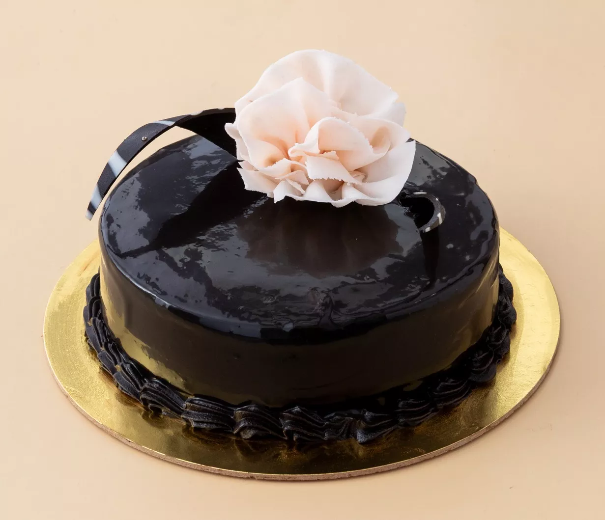 Rich, moist Chocolate Truffle Cake with a silky truffle coating, presented beautifully in Visakhapatnam.