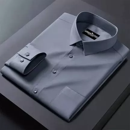 Elegant navy blue men's dress shirt with a tailored fit, suitable for formal occasions, available at MANISHA KUMARI in ADAMWA