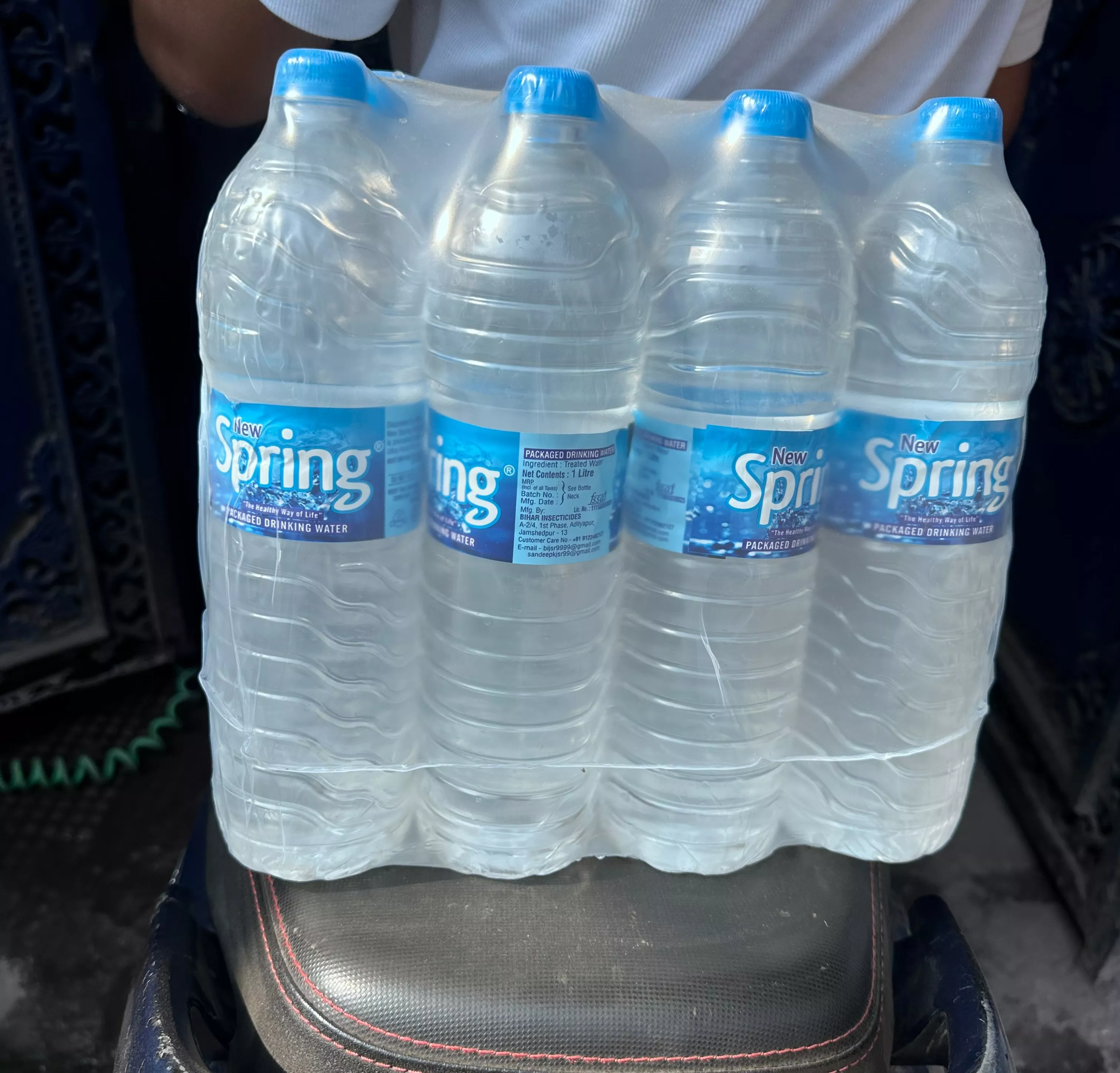 Premium mineral water bottle from AJOONI BLUE in Jamshedpur, showcasing refreshing liquid and essential minerals