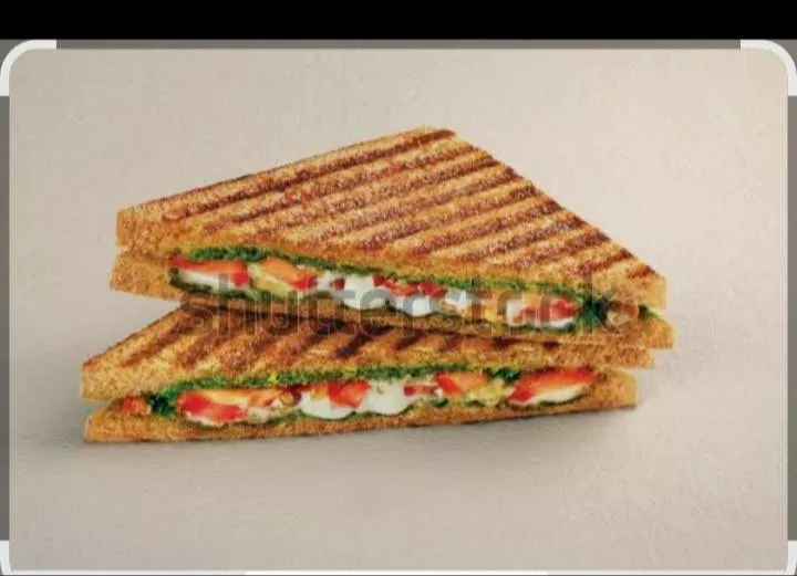 Delicious Grilled Paneer Sandwich with fresh vegetables and mint chutney from FOUR 10 CAFE in Bhawanigarh, served warm and in