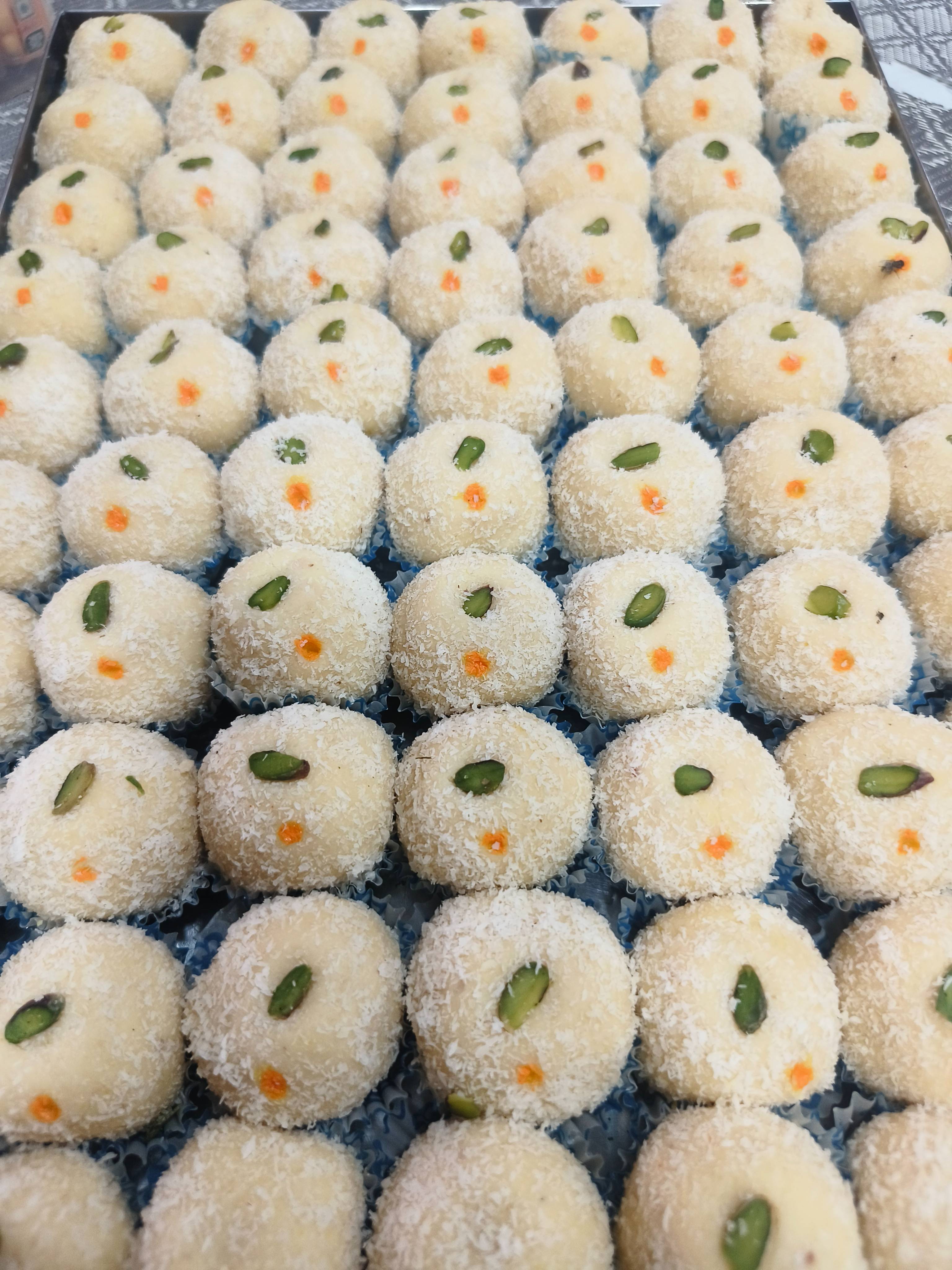  Coconut Ladoo with Pistachio in Chicpawan PARTEEK SWEETS AND RESTAURANTS PARTEEK SWEETS AND  RESTAURANT  RESTAURANT WARD NO 10 KANYA SHALA MARG AGRASEN CHOWK PITHORA LANDMARK NEAR HANUMAN MANDIR PITHORA