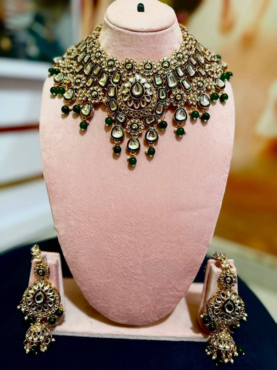 Elegant Royal Kundan Bridal Necklace Set with matching earrings in antique gold plating, showcasing intricate design details 